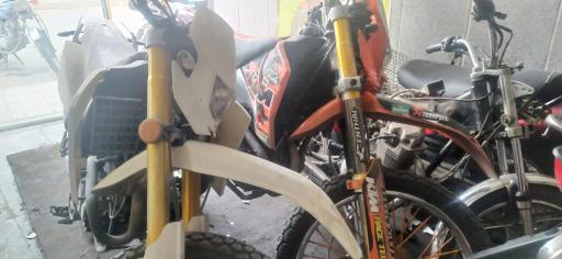 عکس چکاپ هندا تعمیرات انواع موتور سیکلت 