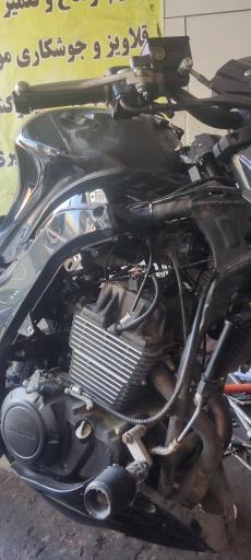 عکس چکاپ هندا تعمیرات انواع موتور سیکلت 