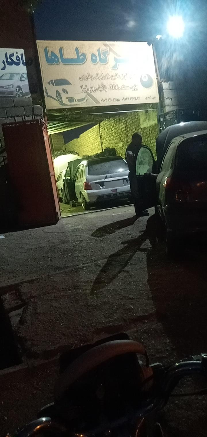 عکس تعمیرگاه طاها