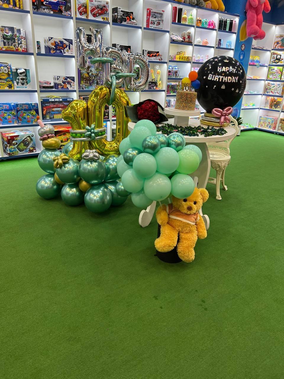 عکس فروشگاه رنگین کمان