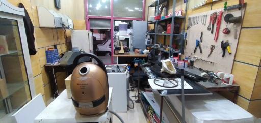 عکس تعمیر لوازم خانگی  عیوضی