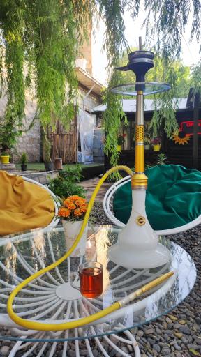 عکس کافه کلبه آفتابگردون 