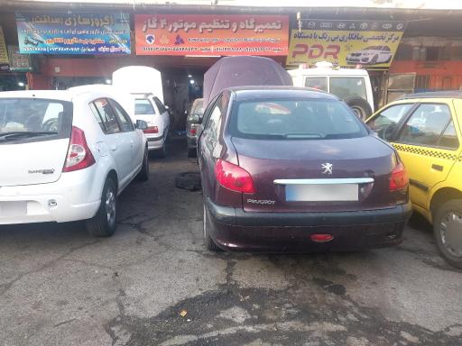 عکس تنظیم موتور ۴ گاز  معاینه فنی