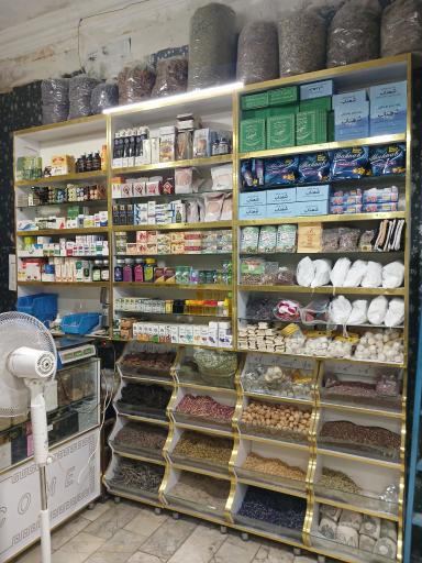 عکس عطاری مادر