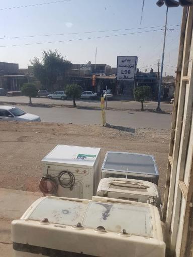 عکس تعمیرات لباسشویی برزگر