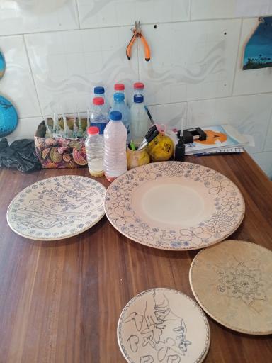 کارگاه ظروف میناکاری و نقاشی های دیوارکوب