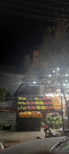 عکس میوه فروشی آقای سیب