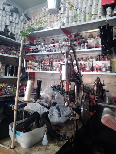 عکس تعمیرات کیف و کفش کریمی