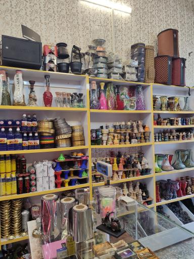 عکس دخانیات و قلیان سوزان برغندان