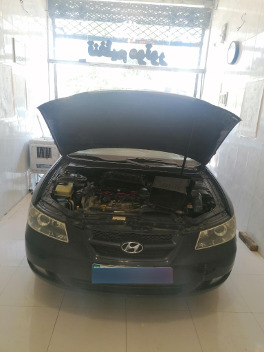 عکس خدمات برق و تنظیم موتور خودرو کورنگی