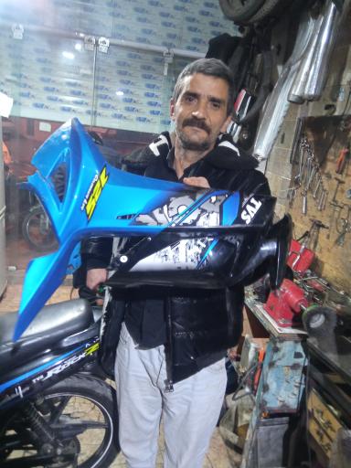 عکس تعمیرگاه موتورسيکلت