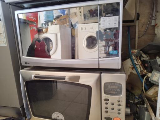 عکس تعمیر ماکروفر و ماکرویو و برد الکترونیکی لوازم‌خانگی