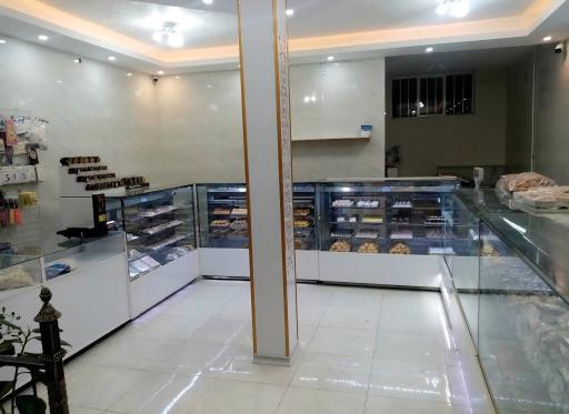 عکس شیرینی سرای باران 