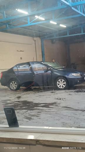 عکس کارواش باران