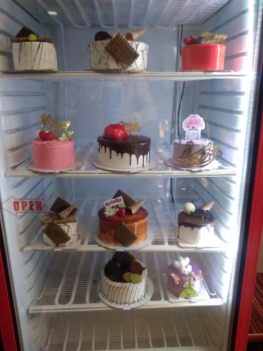 عکس شیرینی فروشی گندم 