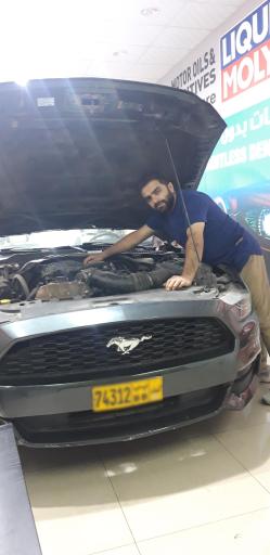 عکس مکانیکی و تنظیم موتور رضا هاشمی