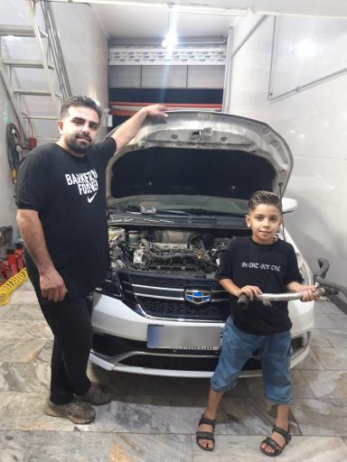 عکس مکانیکی و تنظیم موتور رضا هاشمی