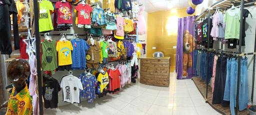 عکس پوشاک کودک و نوجوان دلا