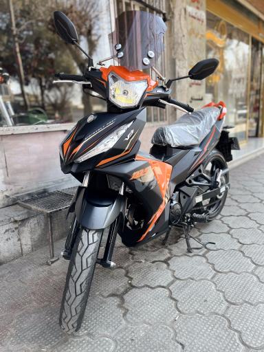 عکس تعمیرگاه موتورسیکلت تیزرو