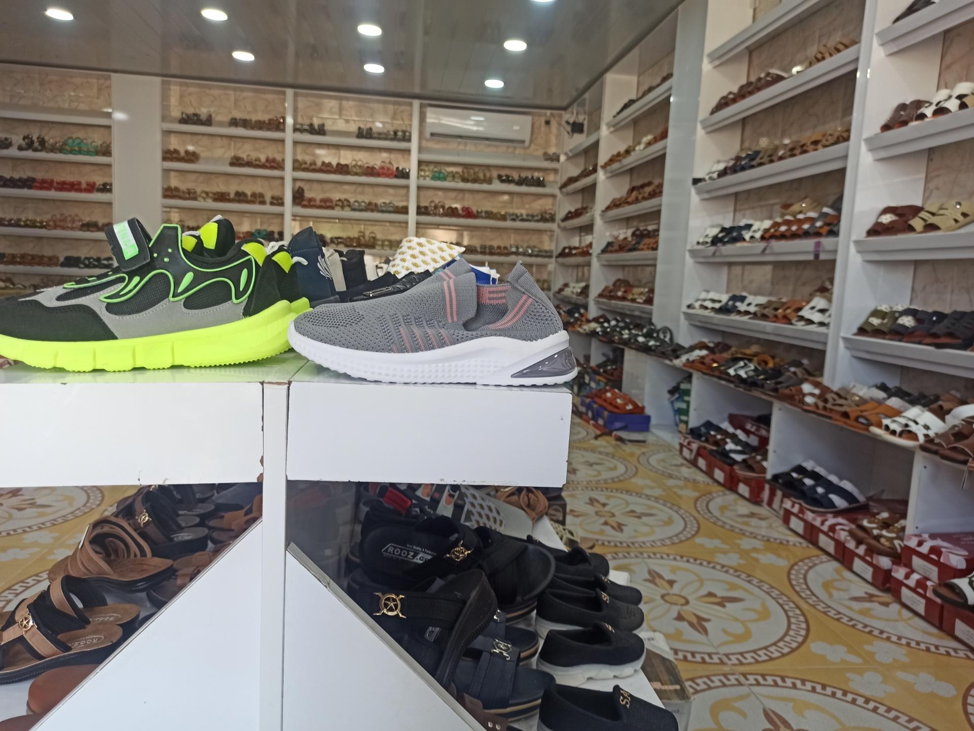 عکس کفش فروشی عبدالله