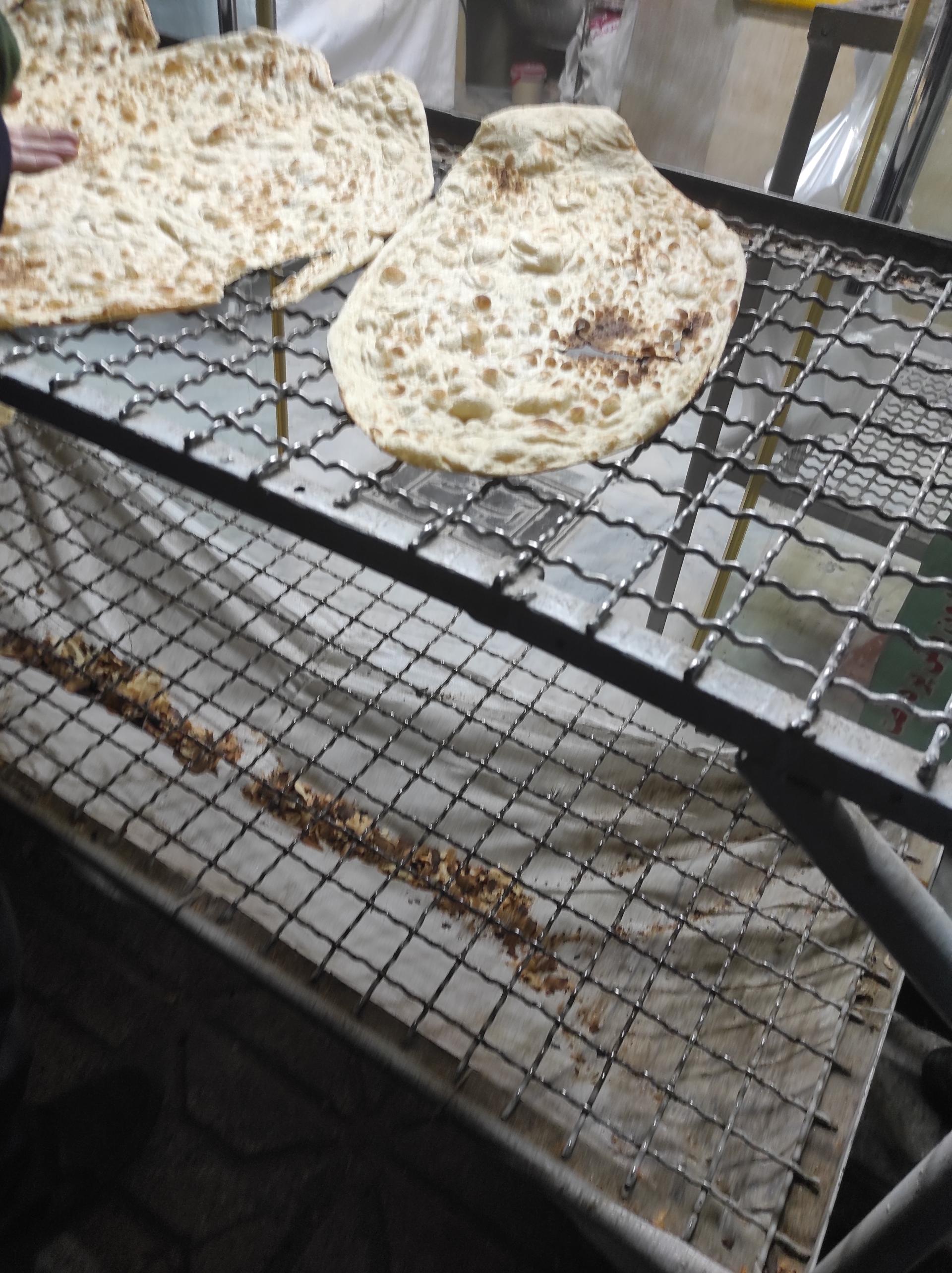 عکس نانوایی تنوری