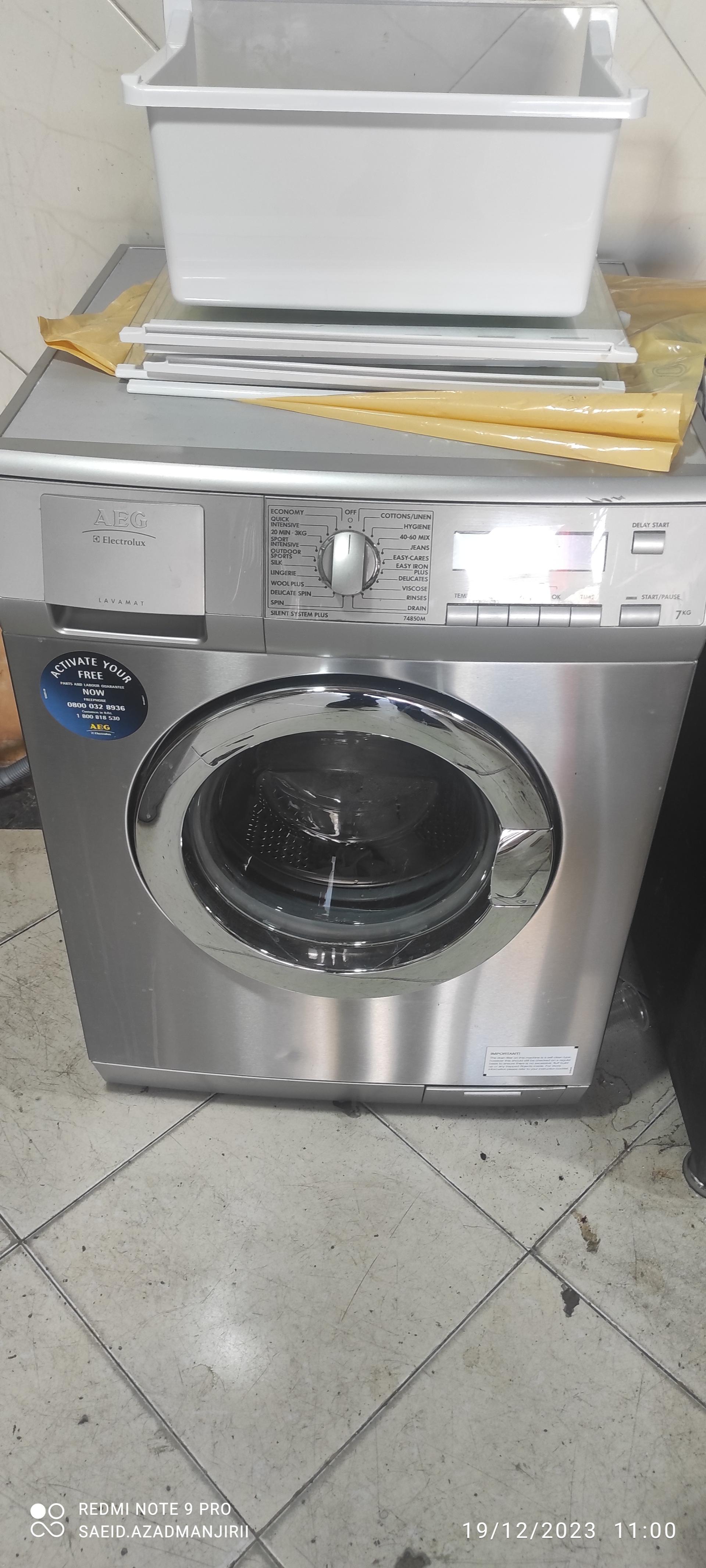 عکس تعمیرات لوازم خانگی آزاد