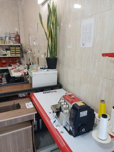 عکس فروشگاه و تعمیرات چرخ خیاطی نهال