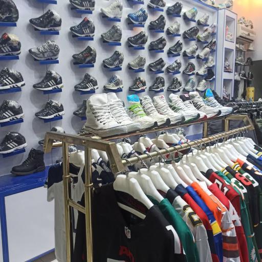 عکس فروشگاه اورجینال اسپرت قم