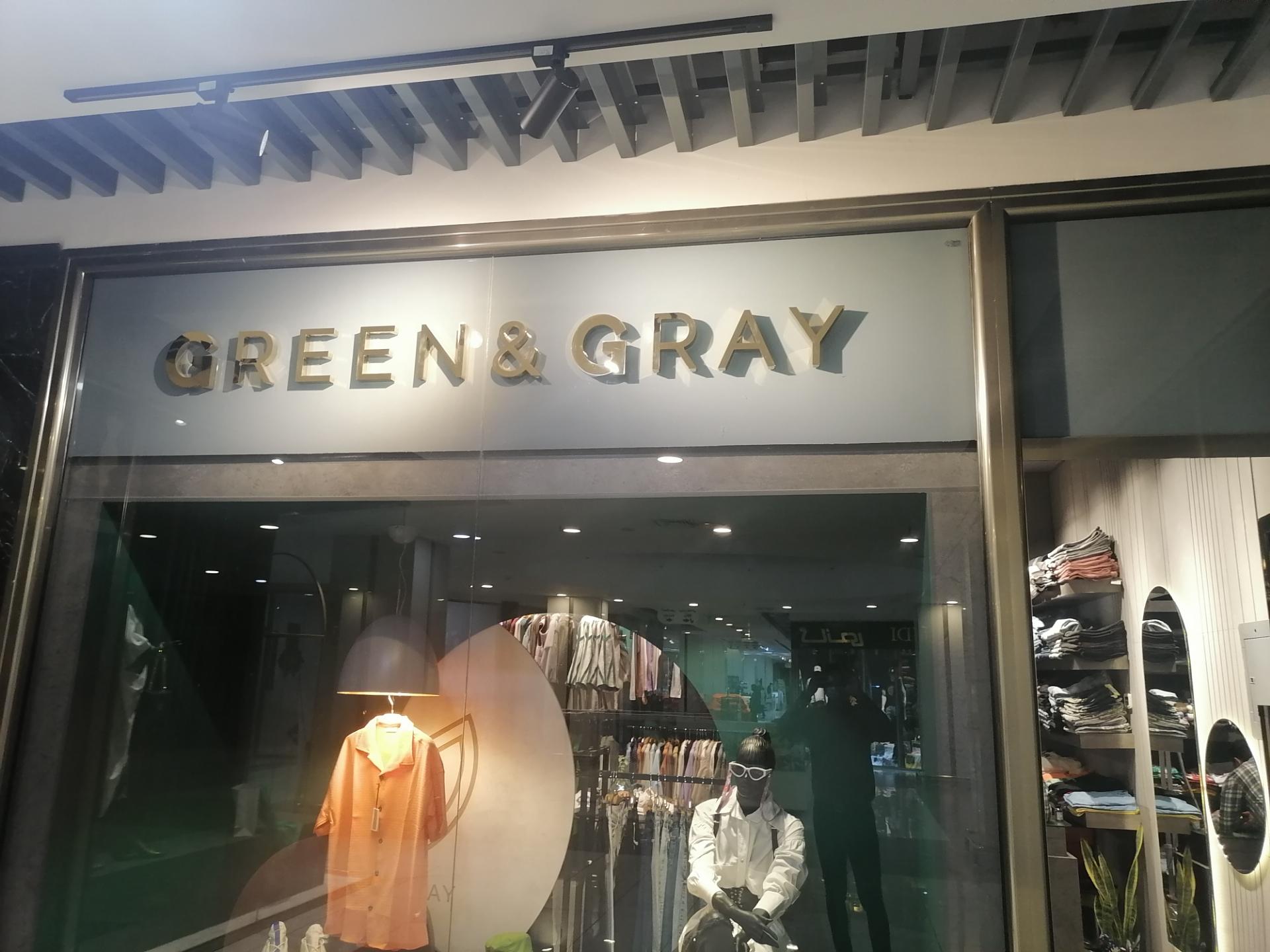 عکس پوشاک مردانه و زنانه سبز و خاکستری 