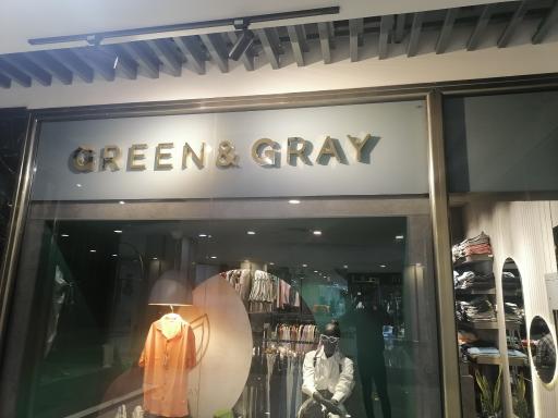 عکس پوشاک مردانه و زنانه سبز و خاکستری 