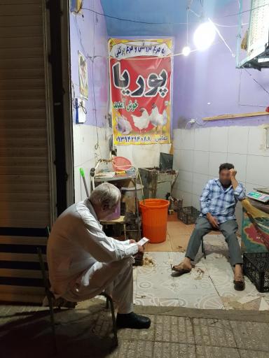 عکس مرغ فروشی و پرکنی