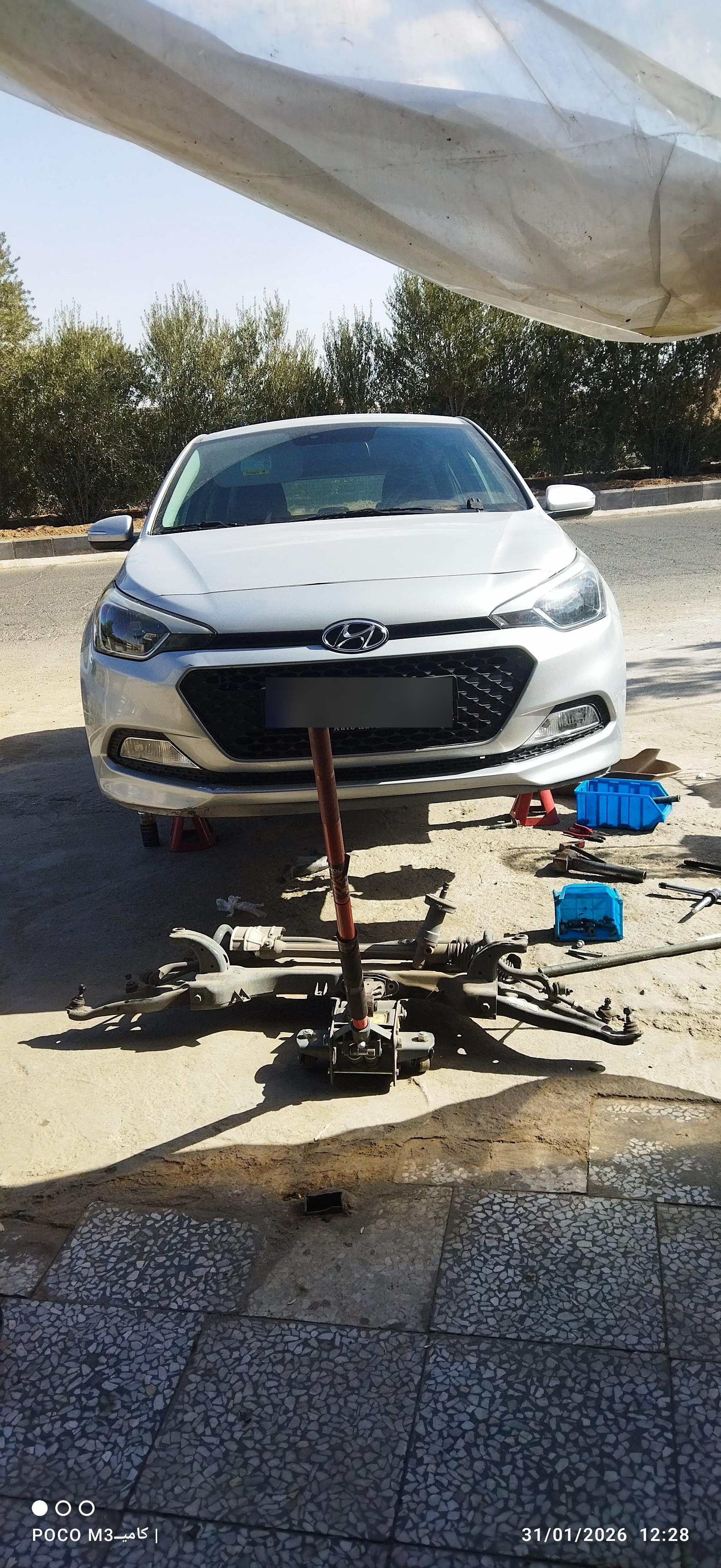عکس تعمیرگاه اتومبیل دنده معکوس