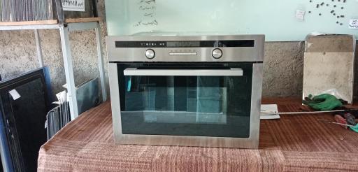 عکس خدمات شیشه اجاق‌گاز