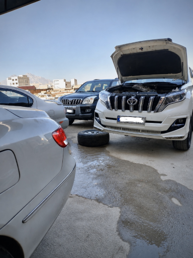 عکس تنظیم موتور و مکانیکی پارسا