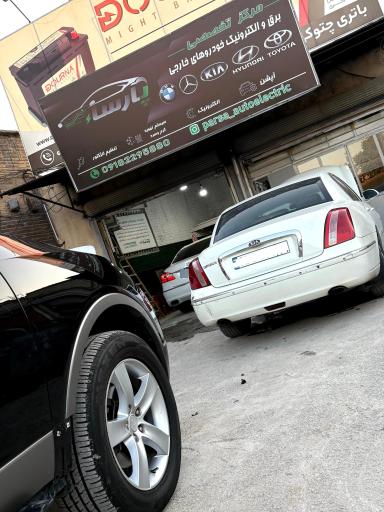 عکس تنظیم موتور و مکانیکی پارسا