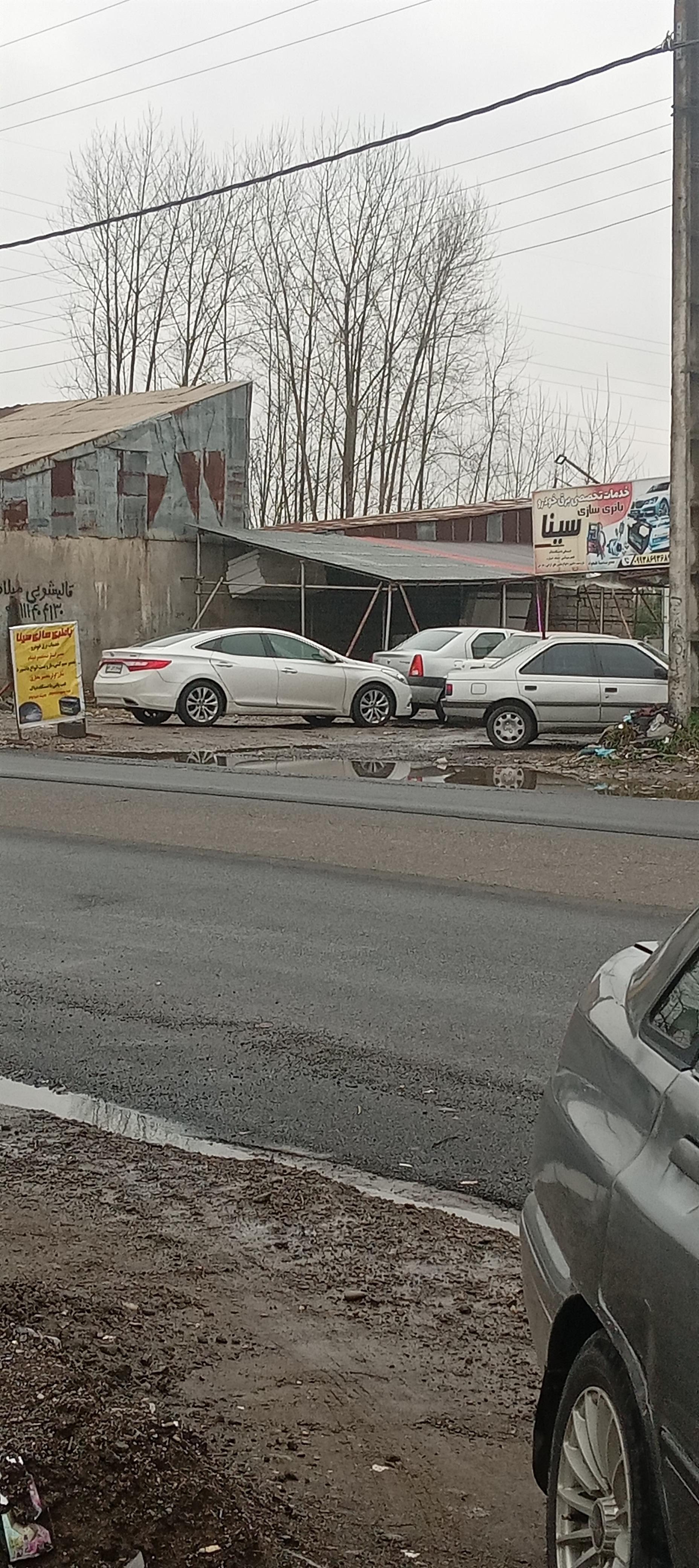 عکس برق خودرو باطری سازی سینا