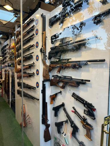 عکس لوازم شکاری و تفنگ بادی کمان گیر 