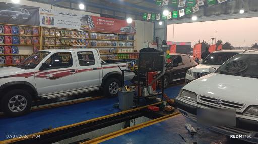 عکس تعویض روغن و لاستیک