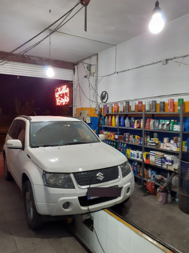 عکس مکانیکی و باطری سازی داود و محمد