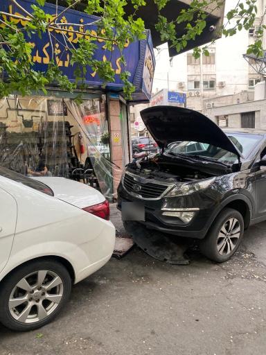 تعمیرگاه کولر اتومبیل ۲۰۰۰