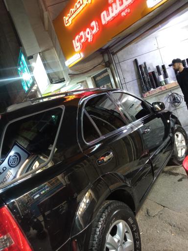 عکس  اولین مرکز تخصصی شیشه دودی