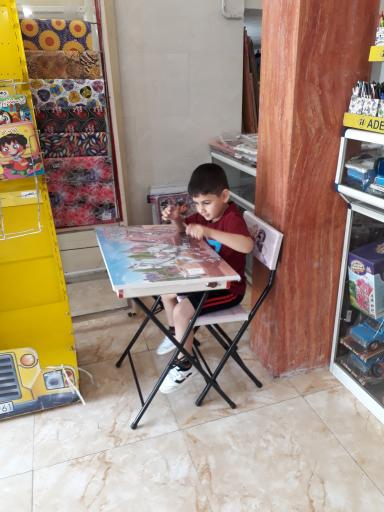 عکس کتابفروشی ونوشت افزار لاله