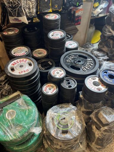 عکس فروشگاه ورزشی رکورد