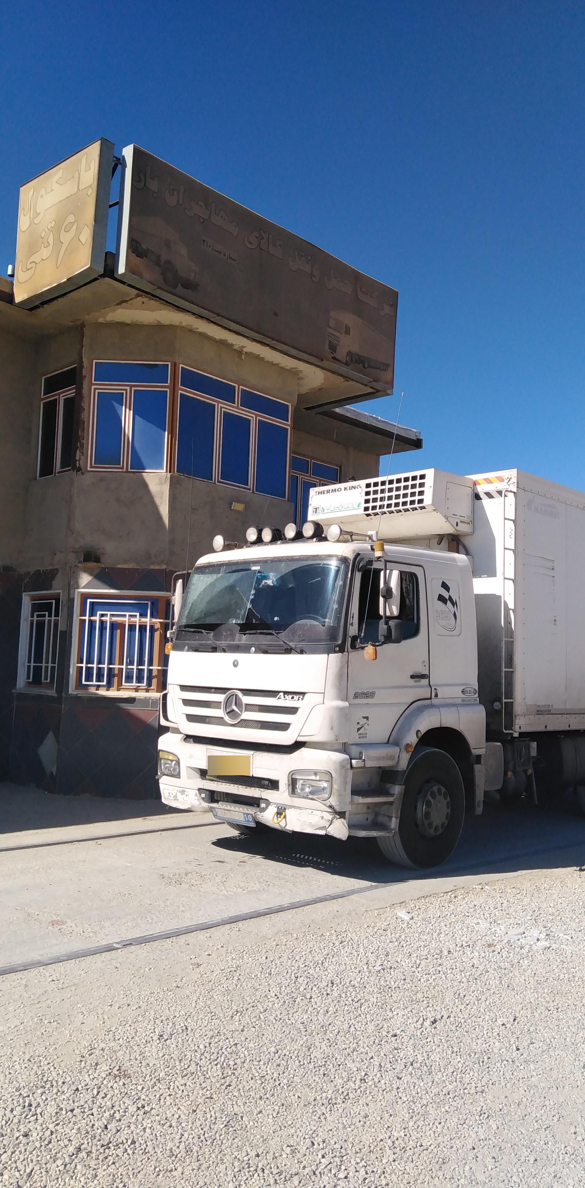 عکس باسکول و باربری مهاجران بار