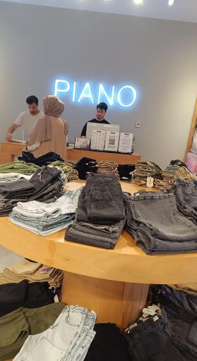 عکس فروشگاه لباس کودک و نوجوان پیانو 
