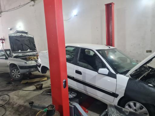 عکس تعمیرگاه زانتیا امید