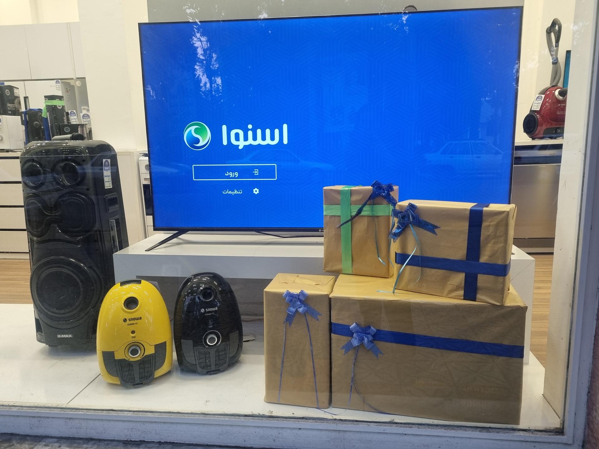 عکس فروشگاه اسنوا