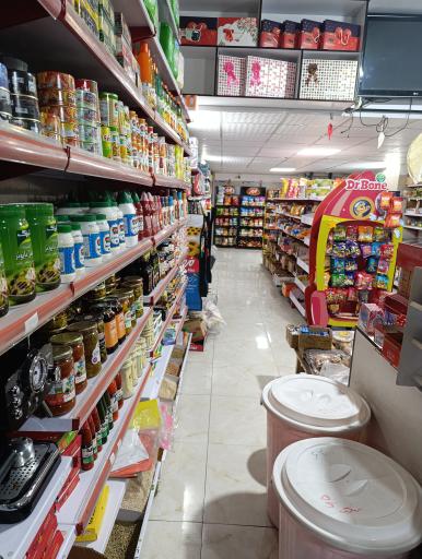 عکس سوپرمارکت مومیوند