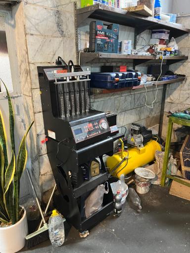 عکس تنظیم موتور و برق اتومبیل زرشکیان