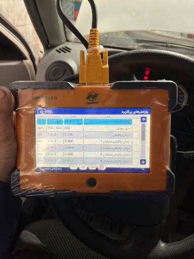عکس تنظیم موتور و برق اتومبیل زرشکیان